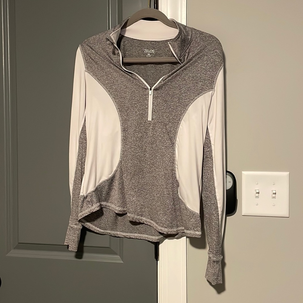 Zelo’s athletic shirt. Size XS